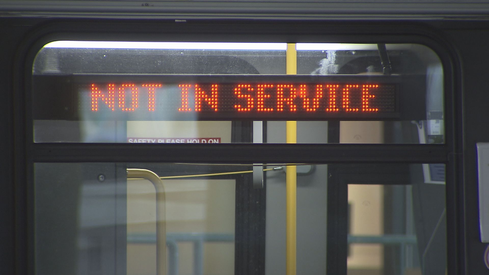 A bus can be seen with a 'Not In Service' sign