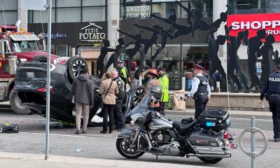 Police investigating after shots were fired from one vehicle at another, causing a crash and rollover in the area of Yonge Street and Empress Avenue in North York on Oct. 7, 2024