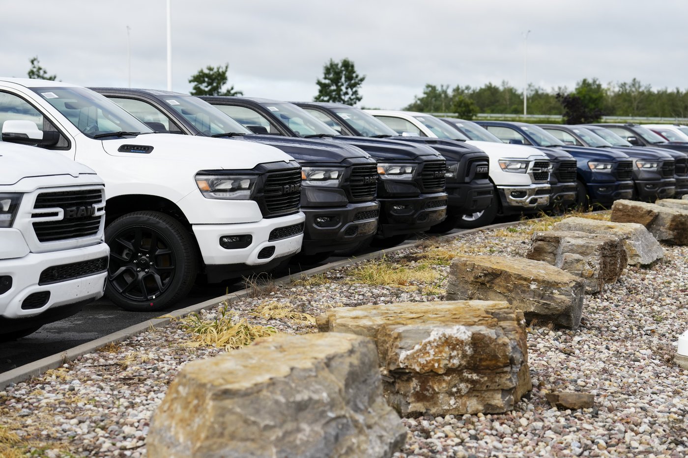 Statistics Canada says retail sales rose 0.9 per cent to $66.4 billion in July, helped by stronger new car sales. Pickup trucks are pictured at an automotive dealership in Ottawa on Friday, Aug. 11, 2023.