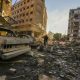 Residents run for cover following an Israeli airstrike in Dahiyeh, Beirut, Lebanon