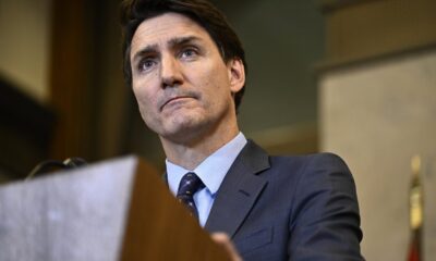 Prime Minister Justin Trudeau listens to a reporter's question during a news conference on Parliament Hill in Ottawa, on Oct. 14, 2024