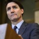 Prime Minister Justin Trudeau listens to a reporter's question during a news conference on Parliament Hill in Ottawa, on Oct. 14, 2024