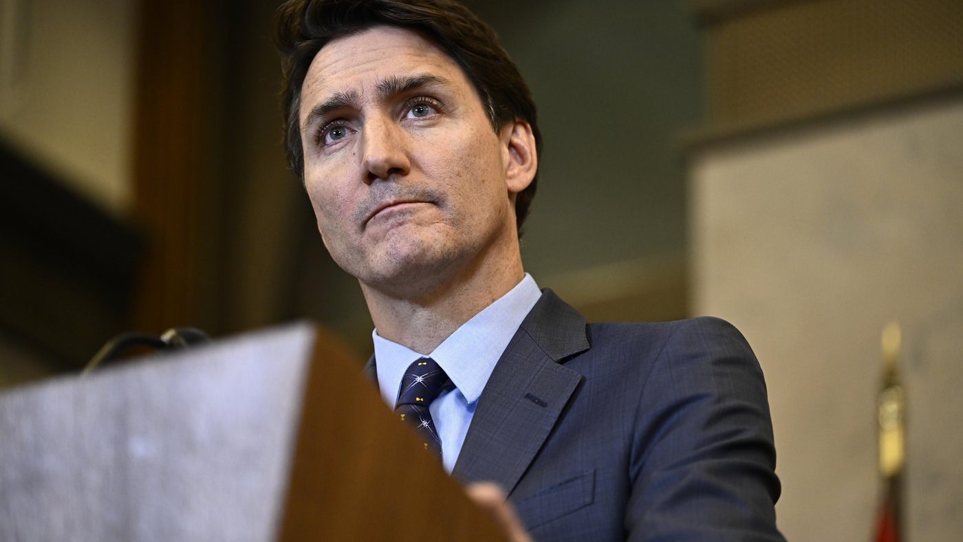 Prime Minister Justin Trudeau listens to a reporter's question during a news conference on Parliament Hill in Ottawa, on Oct. 14, 2024