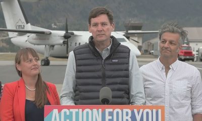 David Eby speaks at a podium