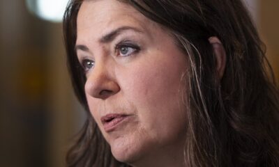 Alberta Premier Danielle Smith speaks with reporters before a meeting in Halifax on July 15, 2024