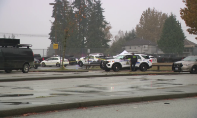 Investigators at the scene of a fatal stabbing outside Tamanawis Secondary School in Surrey on Nov. 22, 2022. (CityNews Image)