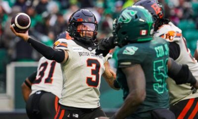 Vernon Adams Jr. throws a football