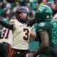 Vernon Adams Jr. throws a football