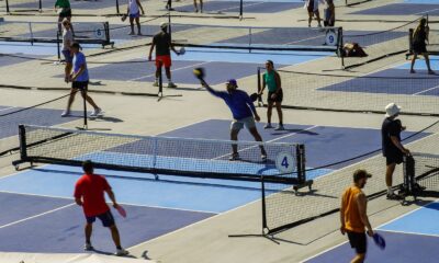 People practice pickleball on the courts of CityPickle at Central Park's Wollman Rink,