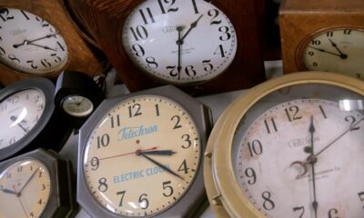 Antique clocks are displayed at the Electric Time Company