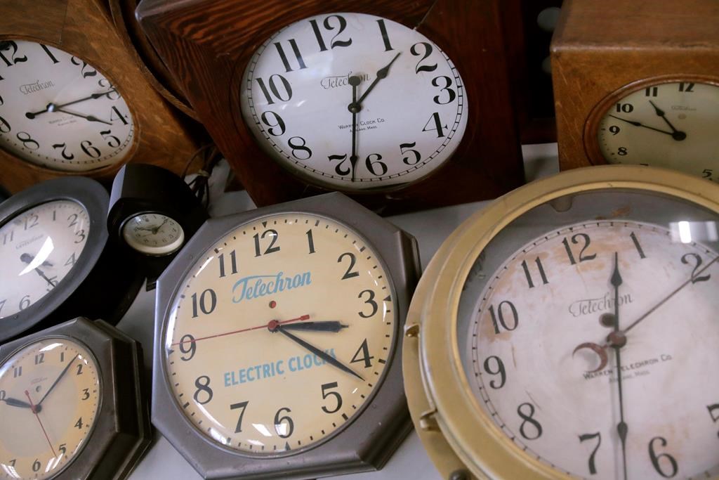 Antique clocks are displayed at the Electric Time Company