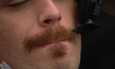 A close up of a Movember moustache that is being tended to