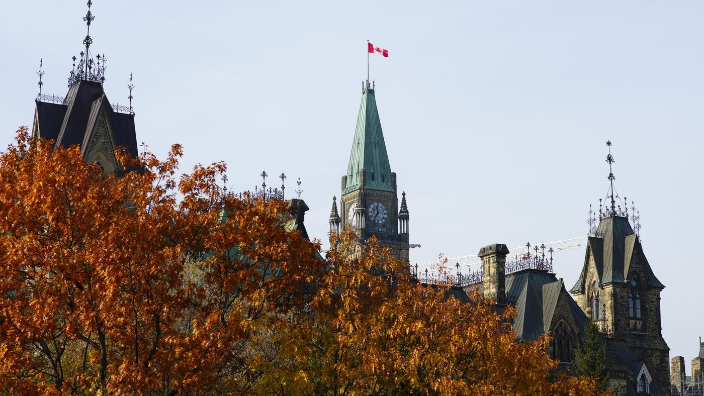 The Canadian flag flies atop the Peace Tower on Parliament Hill in Ottawa on Oct. 30, 2024