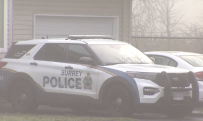 Surrey Police Service members outside a residence where a reported shooting occurred on Monday January 6, 2024.