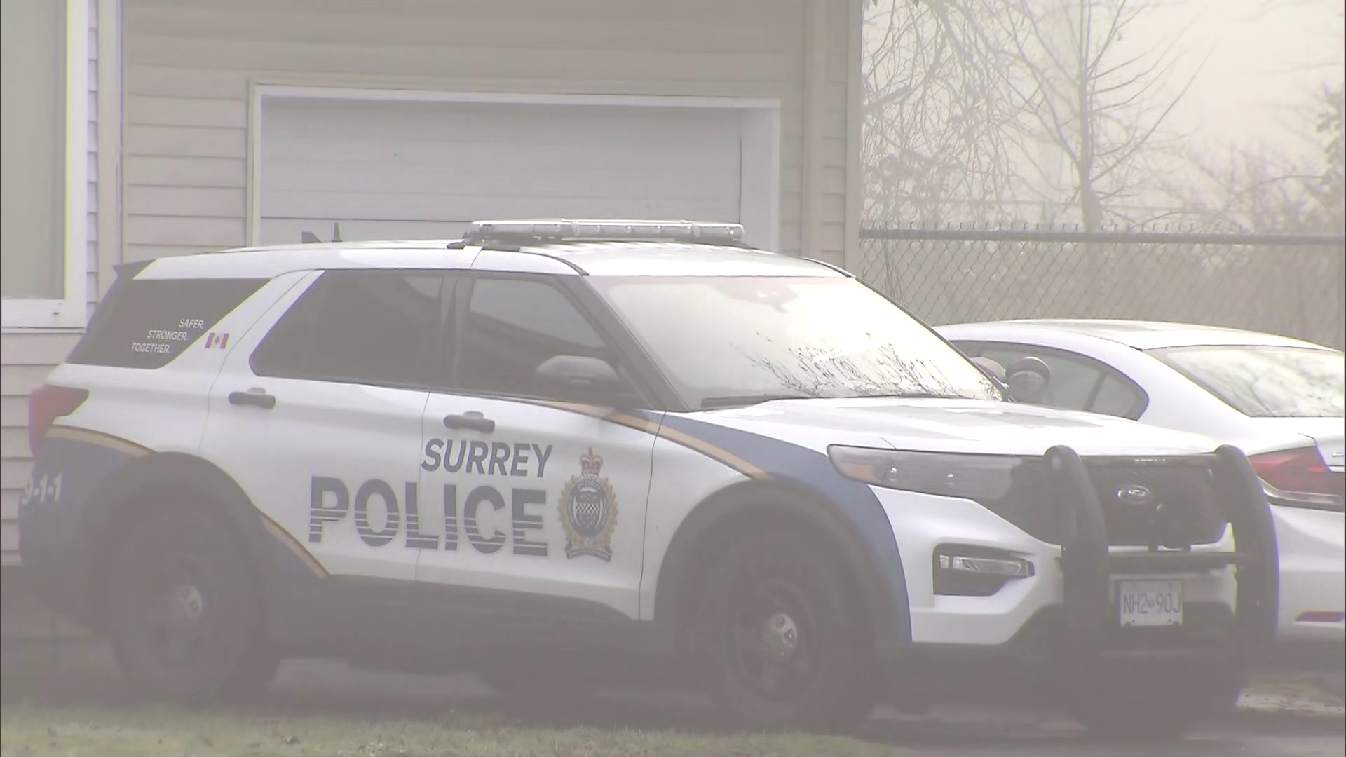 Surrey Police Service members outside a residence where a reported shooting occurred on Monday January 6, 2024.