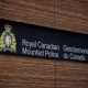 The RCMP logo is seen outside Royal Canadian Mounted Police "E" Division Headquarters, in Surrey, B.C., on Friday April 13, 2018. RCMP say an Ottawa youth has been arrested and charged with terrorism-related offences that allegedly targeted Jewish people.