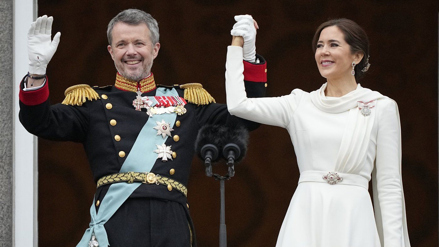 Denmark's King Frederik X and Denmark's Queen Mary wave from the balcony of Christiansborg Palace in Copenhagen, Denmark, Sunday, Jan. 14, 2024