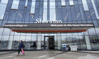 A person leaves Sheridan College's Hazel McCallion Campus in Mississauga