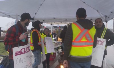 CUPE 4500 members with signs at a picket line after a 48-hour strike, halting bus and SeaBus services, began the morning of Monday, Jan. 22, 2024.