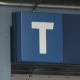 A SkyTrain station sign in Metro Vancouver.