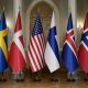 FILE - The Nordic and U.S. flags stand before President Joe Biden poses for a photo with Nordic leaders. Flags from left are Sweden, Denmark, US, Finland, Iceland and Norway, in Helsinki, Finland, July 13, 2023