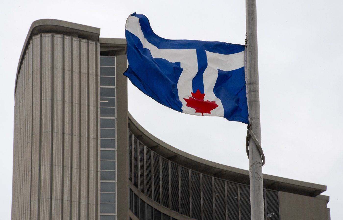 City of Toronto flag flies outside City Hall