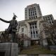 A seagull stands atop a statue of Captain George Vancouver outside Vancouver City Hall, on Saturday, Jan. 9, 2021