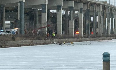 Crews attempt a rescue after a vehicle was submerged in the Keating Channel on January 20, 2024.