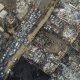 Burnt cars lie on a street after a forest fire reached Villa Independencia neighborhood in Vina del Mar, Chile, Saturday, Feb. 3, 2024.