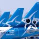 Air Transat aircrafts are seen on the tarmac at Montreal-Trudeau International Airport in Montreal, on Wednesday, April 8, 2020. THE CANADIAN PRESS/Paul Chiasson