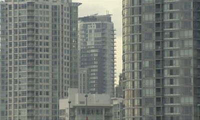 FILE - Condo towers in Vancouver.