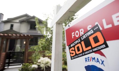 A real estate sign is pictured in Vancouver, B.C., Tuesday, June, 12, 2018.