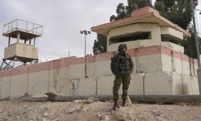 An Israeli soldier stands at the Nitzana border crossing with Egypt in southern Israel