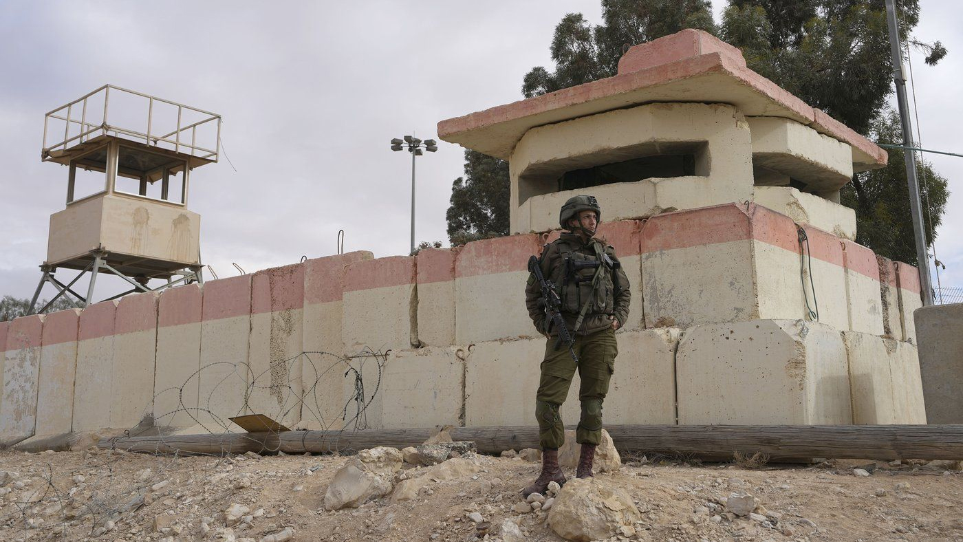 An Israeli soldier stands at the Nitzana border crossing with Egypt in southern Israel