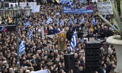 Protesters gather during a rally against same-sex marriage, at central Syntagma square, in Athens, Greece, Sunday, Feb. 11, 2024.