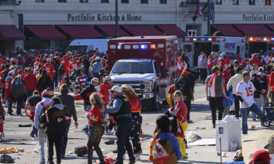 Police clear the area following a shooting at the Kansas City Chiefs NFL football Super Bowl celebration in Kansas City, Mo., Wednesday, Feb. 14, 2024. (AP Photo/Reed Hoffmann)