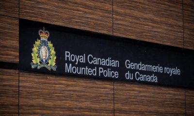 The RCMP logo is seen outside Royal Canadian Mounted Police "E" Division Headquarters, in Surrey, B.C., on Friday April 13, 2018. THE CANADIAN PRESS/Darryl Dyck