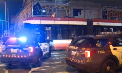 Two people are in custody after a man was stabbed aboard a streetcar in Roncesvalles.