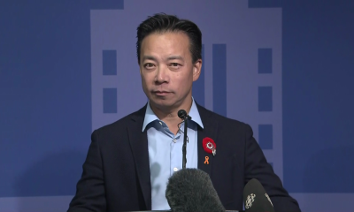 FILE - Vancouver Mayor Ken Sim addresses the media from City Hall in 2022.