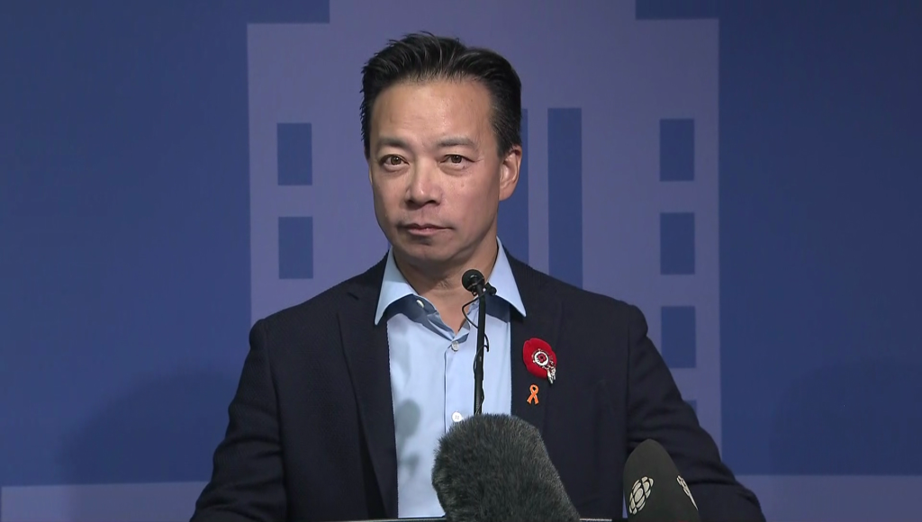 FILE - Vancouver Mayor Ken Sim addresses the media from City Hall in 2022.