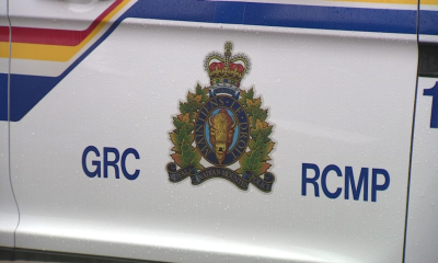 The RCMP logo on the side of a cruiser.