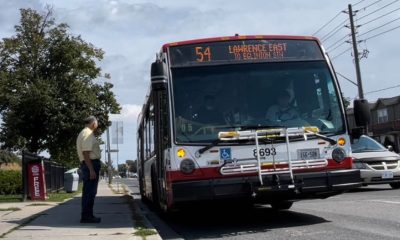 A TTC bus is seen on Lawrence Avenue East.