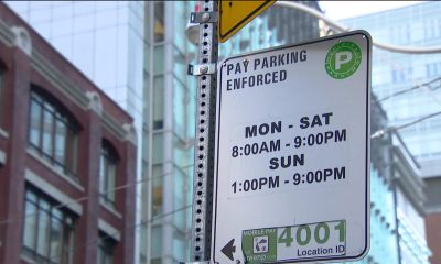 A sign showing paid on-street parking is being enforced