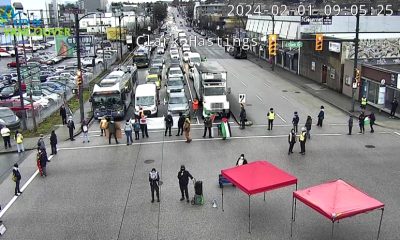 Dozens of demonstrators have blocked entrances to the Port of Vancouver in East Vancouver Thursday morning, calling for an "immediate arms embargo on Israel." (City of Vancouver)