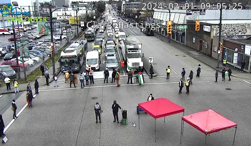 Dozens of demonstrators have blocked entrances to the Port of Vancouver in East Vancouver Thursday morning, calling for an "immediate arms embargo on Israel." (City of Vancouver)