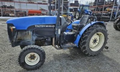 Among the stolen equipment was a blue New Holland tractor - older style.