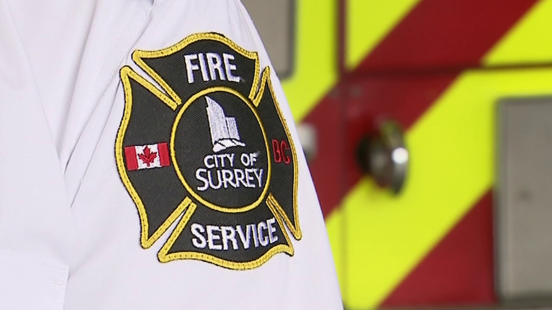 A patch on a Surrey Fire Service member's sleeve.