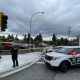 Officers with the Surrey RCMP and Delta Police Department block off a section of Scott Road near 84th Avenue after a daytime shooting left one person hurt on Feb. 2, 2024