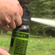 A bear spray canister being deployed