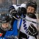 Toronto's Brittany Howard (41) drives Minnesota's Maggie Flaherty (19) into the boards during second period PWHL action in Toronto on Wednesday May 1, 2024